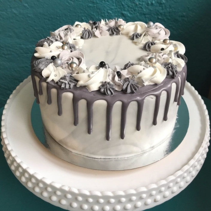 grey drip cake